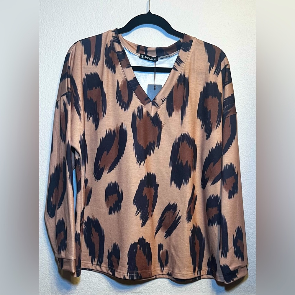 44. SHEILAY PULLOVER TOP ANIMAL  PRINT